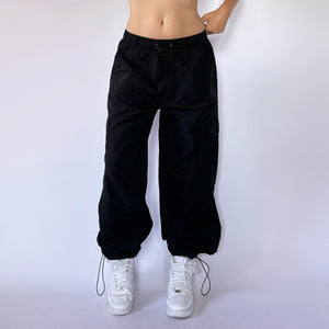 Black swishy track pants online